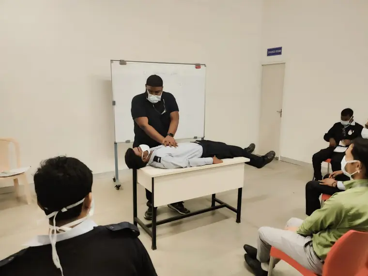CPR and resuscitation demonstration on a training casualty